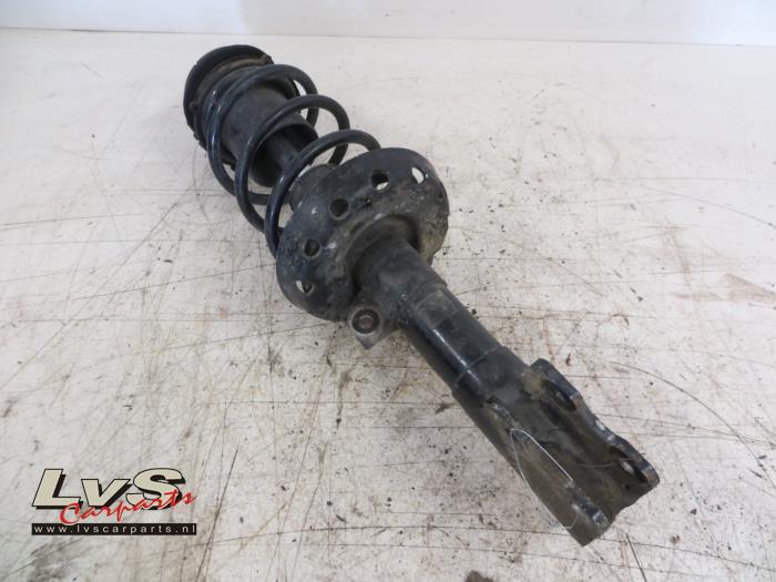 Fronts shock absorber, left from a Opel Astra 1999
