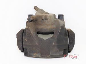 Used Front brake calliper, right Renault Megane III Grandtour (KZ) 1.5 dCi 110 Price € 25,00 Margin scheme offered by Focus Automotive