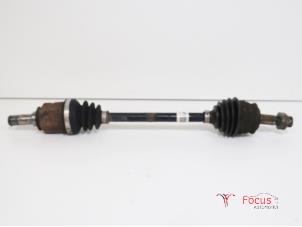 Used Front drive shaft, left Opel Corsa D 1.0 Price € 20,00 Margin scheme offered by Focus Automotive