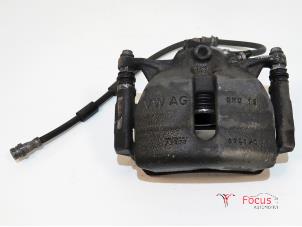 Used Front brake calliper, left Skoda Octavia Combi (5EAC) 1.2 TSI 16V Price € 30,00 Margin scheme offered by Focus Automotive