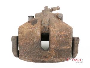 Used Front brake calliper, left Volkswagen Passat (3C2) 1.9 TDI Price € 25,00 Margin scheme offered by Focus Automotive