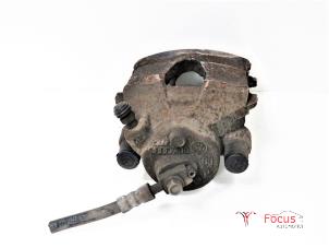 Used Front brake calliper, left Volkswagen Polo V (6R) 1.2 12V BlueMotion Technology Price € 35,00 Margin scheme offered by Focus Automotive