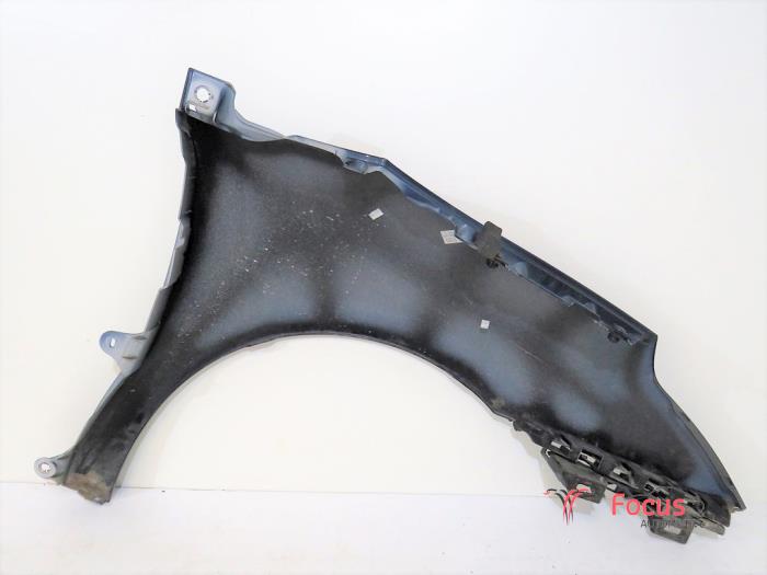 Front wing, left from a Citroën C4 Berline (LC) 1.6 16V VTi 120 2009