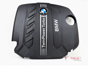 Usados Chapa protectora motor BMW 1 serie (F21) 116d 2.0 16V Precio € 35,00 Norma de margen ofrecido por Focus Automotive