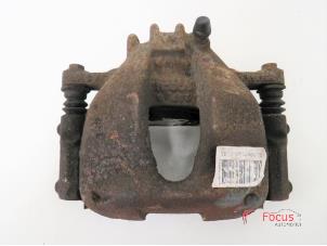 Used Front brake calliper, left Peugeot 3008 I (0U/HU) 1.6 HDiF 16V Price € 35,00 Margin scheme offered by Focus Automotive