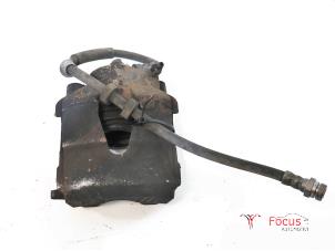 Used Front brake calliper, left Volkswagen Polo V (6R) 1.4 TDI 12V 90 Price € 33,28 Inclusive VAT offered by Focus Automotive