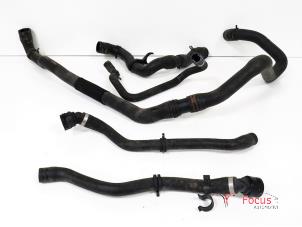 Used Radiator hose Mini Mini (R56) 1.4 16V One Price € 25,00 Margin scheme offered by Focus Automotive