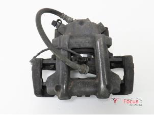 Used Front brake calliper, left BMW 1 serie (F20) 116d 1.5 12V TwinPower Price € 12,95 Margin scheme offered by Focus Automotive