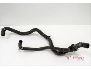 Used Radiator hose Renault Twingo III (AH) 1.0 SCe 70 12V Price € 25,00 Margin scheme offered by Focus Automotive