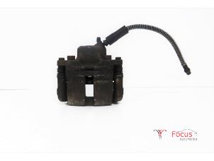 Used Front brake calliper, left Renault Twingo II (CN) 1.2 16V Price € 14,95 Margin scheme offered by Focus Automotive