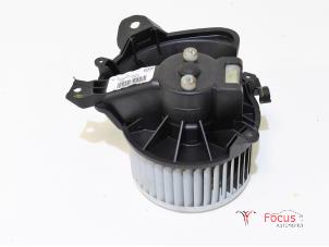 Usados Motor de ventilador de calefactor Opel Corsa E 1.2 16V Precio € 14,95 Norma de margen ofrecido por Focus Automotive