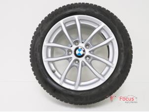 Usagé Jante + pneu d'hiver BMW 1 serie (F20) 116d 1.5 12V TwinPower Prix € 99,00 Règlement à la marge proposé par Focus Automotive
