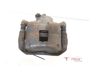 Used Front brake calliper, right Fiat Bravo (198A) 1.6 D Multijet 90 Price € 25,00 Margin scheme offered by Focus Automotive
