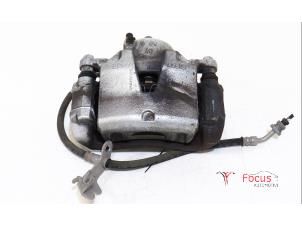 Used Front brake calliper, right Kia Sportage (QL) 1.6 GDI 132 16V 4x2 Price € 60,00 Margin scheme offered by Focus Automotive
