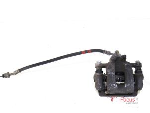 Used Rear brake calliper, right Kia Sportage (QL) 1.6 GDI 132 16V 4x2 Price € 65,00 Margin scheme offered by Focus Automotive