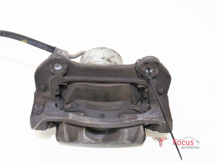 Front brake calliper, left from a Kia Sportage (QL) 1.6 GDI 132 16V 4x2 2019