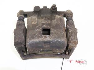 Used Front brake calliper, left Mazda 2 (DE) 1.4 CDVi 16V Price € 14,95 Margin scheme offered by Focus Automotive