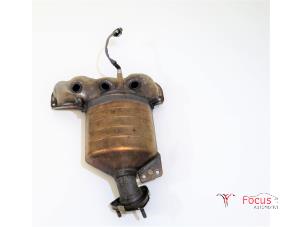 Used Exhaust manifold + catalyst Opel Corsa D 1.2 16V Price € 225,00 Margin scheme offered by Focus Automotive