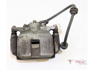 Used Front brake calliper, left Renault Scénic IV (RFAJ) 1.2 TCE 130 16V Price € 45,00 Margin scheme offered by Focus Automotive