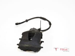 Used Front brake calliper, left Volkswagen Up! (121) 1.0 12V 60 Price € 5,00 Margin scheme offered by Focus Automotive