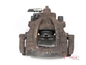 Used Front brake calliper, right BMW Mini One/Cooper (R50) 1.6 16V One Price € 20,00 Margin scheme offered by Focus Automotive