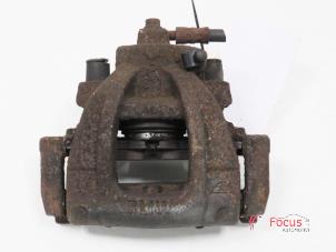 Used Front brake calliper, left BMW Mini One/Cooper (R50) 1.6 16V One Price € 20,00 Margin scheme offered by Focus Automotive