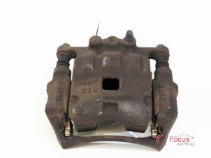 Used Front brake calliper, left Ford Fiesta 6 (JA8) 1.25 16V Price € 12,99 Margin scheme offered by Focus Automotive