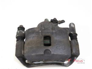 Used Front brake calliper, left Hyundai i10 (F5) 1.1i 12V Price € 25,00 Margin scheme offered by Focus Automotive