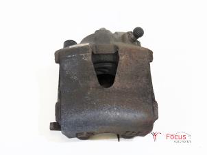 Used Front brake calliper, left Volkswagen Golf VII (AUA) 1.6 TDI 16V Price € 25,00 Margin scheme offered by Focus Automotive