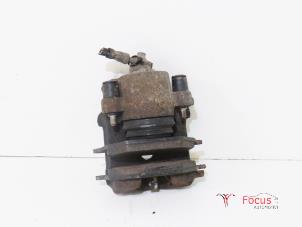 Used Front brake calliper, left Seat Leon (1P1) 1.6 Price € 5,00 Margin scheme offered by Focus Automotive