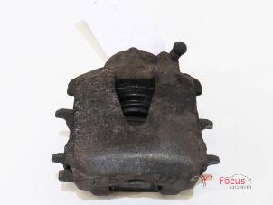 Used Front brake calliper, left Volkswagen Polo V (6R) 1.6 TDI 16V 90 Price € 5,00 Margin scheme offered by Focus Automotive