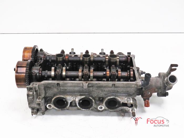 Cylinder head from a Nissan Pixo (D31S) 1.0 12V 2013