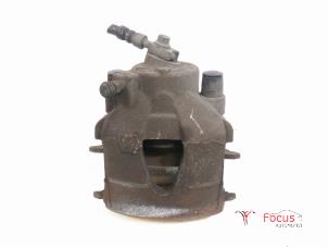 Used Front brake calliper, right Audi A1 (8X1/8XK) 1.6 TDI 16V Price € 4,99 Margin scheme offered by Focus Automotive