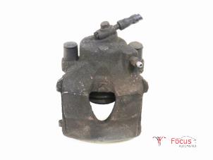 Used Front brake calliper, left Seat Leon (1P1) 1.9 TDI 105 Price € 5,00 Margin scheme offered by Focus Automotive