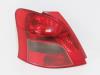Taillight, left from a Toyota Yaris II (P9), 2005 / 2014 1.4 D-4D, Hatchback, Diesel, 1.364cc, 66kW (90pk), FWD, 1NDTV, 2005-08 / 2012-12, NLP90 2007