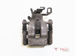 Used Rear brake calliper, left Mini Countryman (R60) 1.6 16V Cooper Price € 35,00 Margin scheme offered by Focus Automotive