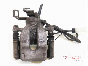 Used Rear brake calliper, right Mini Countryman (R60) 1.6 16V Cooper Price € 35,00 Margin scheme offered by Focus Automotive
