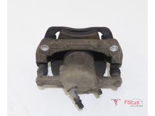 Used Front brake calliper, left Renault Kangoo Express (FW) 1.5 dCi 75 Price € 20,00 Margin scheme offered by Focus Automotive