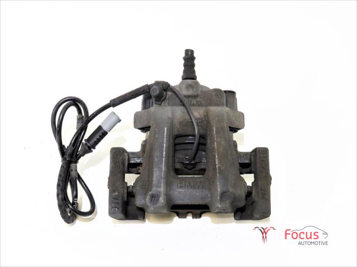 Gebrauchte Bremszange rechts hinten BMW 1 serie (F20) 118i 1.5 TwinPower 12V Preis € 30,00 Margenregelung angeboten von Focus Automotive