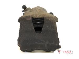 Used Front brake calliper, right Volkswagen Polo V (6R) 1.6 TDI 16V 90 Price € 4,99 Margin scheme offered by Focus Automotive