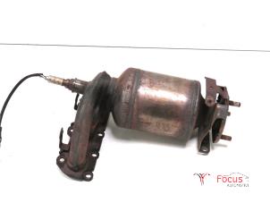 Used Exhaust manifold + catalyst Seat Ibiza IV (6J5) 1.2 12V Price € 169,95 Margin scheme offered by Focus Automotive