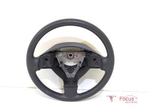 Used Steering wheel Nissan Pixo (D31S) 1.0 12V Price € 29,95 Margin scheme offered by Focus Automotive
