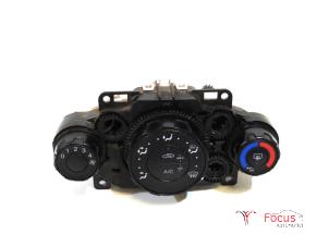 Usados Panel de control de calefacción Ford Fiesta 6 (JA8) 1.25 16V Precio € 25,00 Norma de margen ofrecido por Focus Automotive