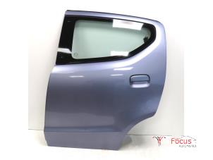 Używane Drzwi lewe tylne wersja 4-drzwiowa Nissan Pixo (D31S) 1.0 12V Cena € 225,00 Procedura marży oferowane przez Focus Automotive