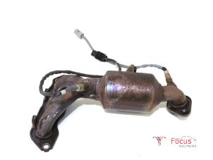 Used Exhaust manifold + catalyst Nissan Pixo (D31S) 1.0 12V Price € 189,95 Margin scheme offered by Focus Automotive