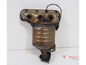 Used Exhaust manifold + catalyst Opel Corsa E 1.2 16V Price € 200,00 Margin scheme offered by Focus Automotive