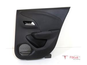 Used Rear door trim 4-door, right Opel Corsa F (UB/UH/UP) 1.2 12V 75 Price € 50,00 Margin scheme offered by Focus Automotive