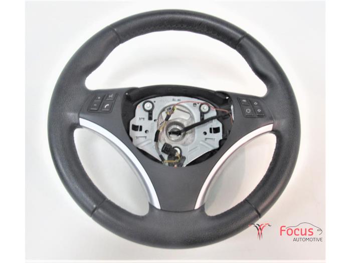 Steering wheel from a BMW X1 (E84) sDrive 18i 2.0 16V 2010