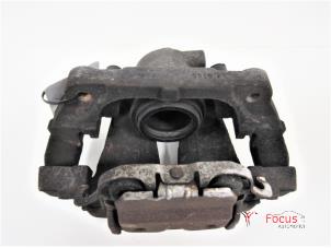 Used Front brake calliper, left BMW X5 (E70) xDrive 35d 3.0 24V Price € 12,95 Margin scheme offered by Focus Automotive