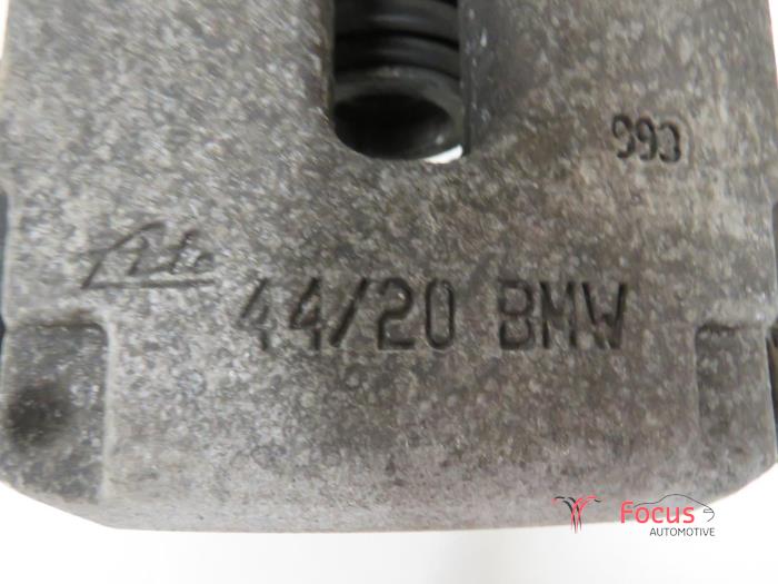 Rear brake calliper, left from a BMW X5 (E70) xDrive 35d 3.0 24V 2010
